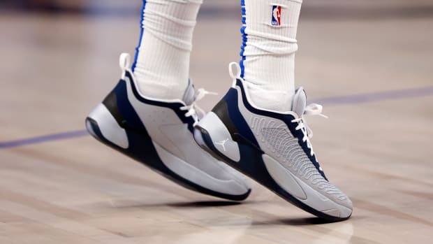 Grey and black Jordan Luka 1 shoes.